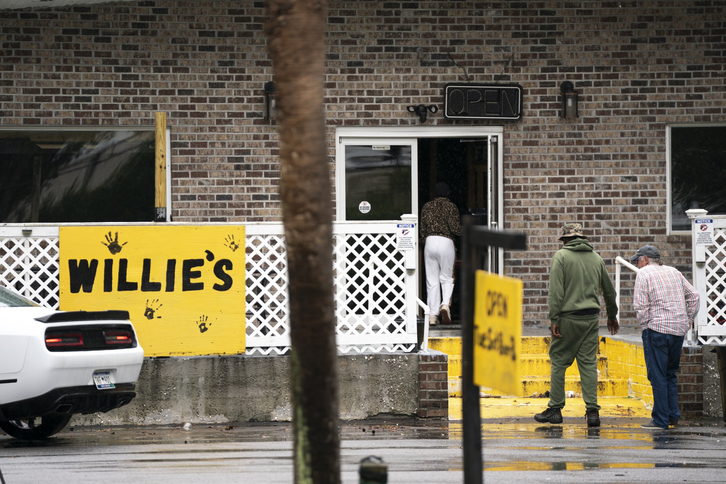 Bar owner tells of panic after four shot dead at high school reunion in South Carolina bar